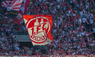 Cologne supporter wave flags during the German first division Bundesliga football match FC Cologne vs FC Bayern Munich in Cologne, western Germany, on May 5, 2018. (Photo by Patrik STOLLARZ / AFP) / RESTRICTIONS: DURING MATCH TIME: DFL RULES TO LIMIT THE ONLINE USAGE TO 15 PICTURES PER MATCH AND FORBID IMAGE SEQUENCES TO SIMULATE VIDEO. == RESTRICTED TO EDITORIAL USE == FOR FURTHER QUERIES PLEASE CONTACT DFL DIRECTLY AT + 49 69 650050 (Photo credit should read PATRIK STOLLARZ/AFP/Getty Images)