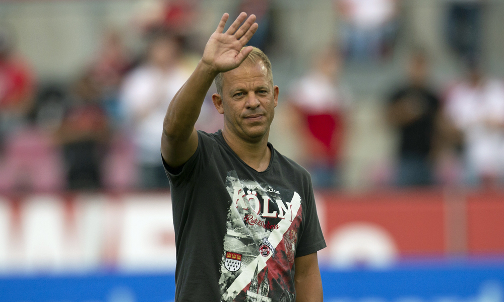 COLOGNE, GERMANY - AUGUST 13: Manager Markus Anfang waves to spectators during the Second Bundesliga match between 1. FC Koeln and 1. FC Union Berlin at RheinEnergieStadion on August 13, 2018 in Cologne, Germany. (Photo by Juergen Schwarz/Bongarts/Getty Images)