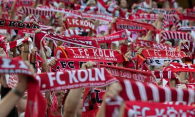 COLOGNE, GERMANY - AUGUST 13: Supporters of Cologne lift their scarfs during the Second Bundesliga match between 1. FC Koeln and 1. FC Union Berlin at RheinEnergieStadion on August 13, 2018 in Cologne, Germany. (Photo by Juergen Schwarz/Bongarts/Getty Images)