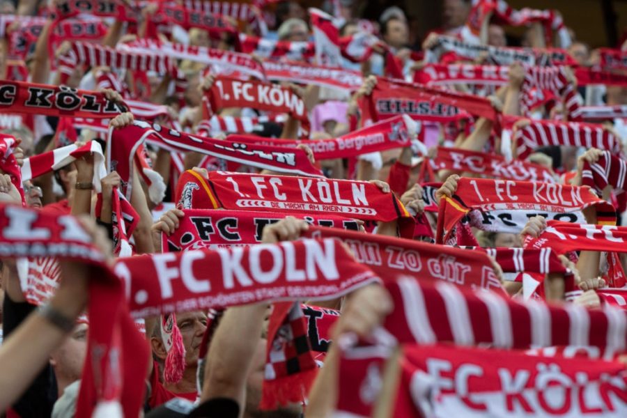 COLOGNE, GERMANY - AUGUST 13: Supporters of Cologne lift their scarfs during the Second Bundesliga match between 1. FC Koeln and 1. FC Union Berlin at RheinEnergieStadion on August 13, 2018 in Cologne, Germany. (Photo by Juergen Schwarz/Bongarts/Getty Images)