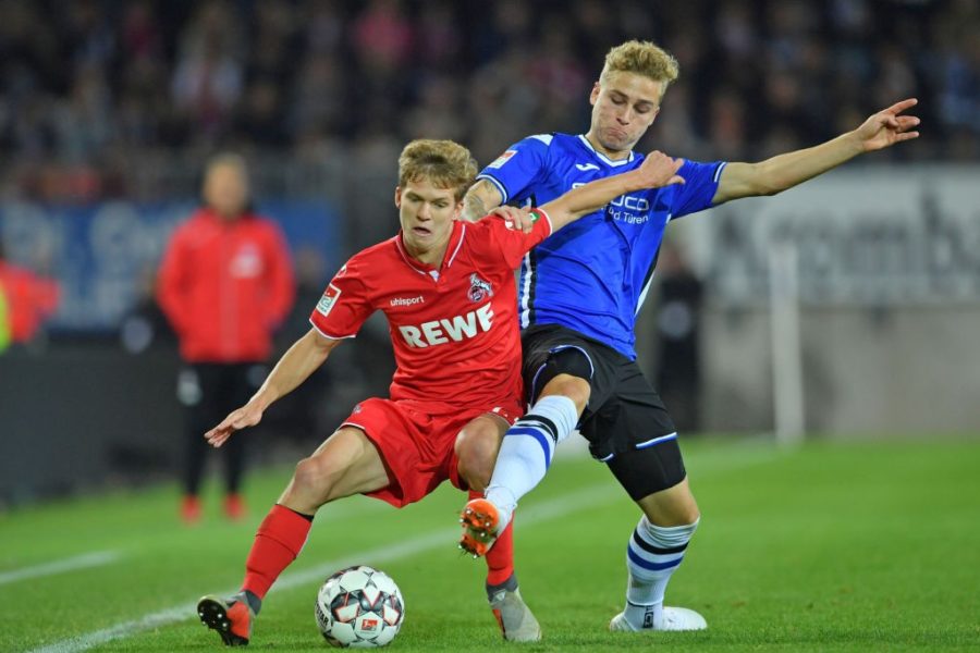 BIELEFELD, GERMANY - SEPTEMBER 28: Vincent Koziello (L) of Koeln and Nils Seufert of Bielefeld fight for the ball during the Second Bundesliga match between DSC Arminia Bielefeld and 1. FC Koeln at Schueco Arena on September 28, 2018 in Bielefeld, Germany. (Photo by Thomas Starke/Bongarts/Getty Images)