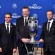 (FromL) Head of Germany's bid to host the Euro 2024 Philipp Lahm, German Football Association (DFB) president Reinhard Grindel and UEFA president Aleksander Ceferin pose with the UEFA Euro trophy after it was announced that Germany was elected to host the Euro 2024 fooball tournament during a ceremony at the headquarters of the European football's governing body in Nyon on September 27, 2018. - UEFA selected the host of the 2024 European Championship today in a vote pitting a safe German bid against a riskier Turkish proposal that offers a chance to explore new terrain. (Photo by Fabrice COFFRINI / AFP) (Photo credit should read FABRICE COFFRINI/AFP/Getty Images)