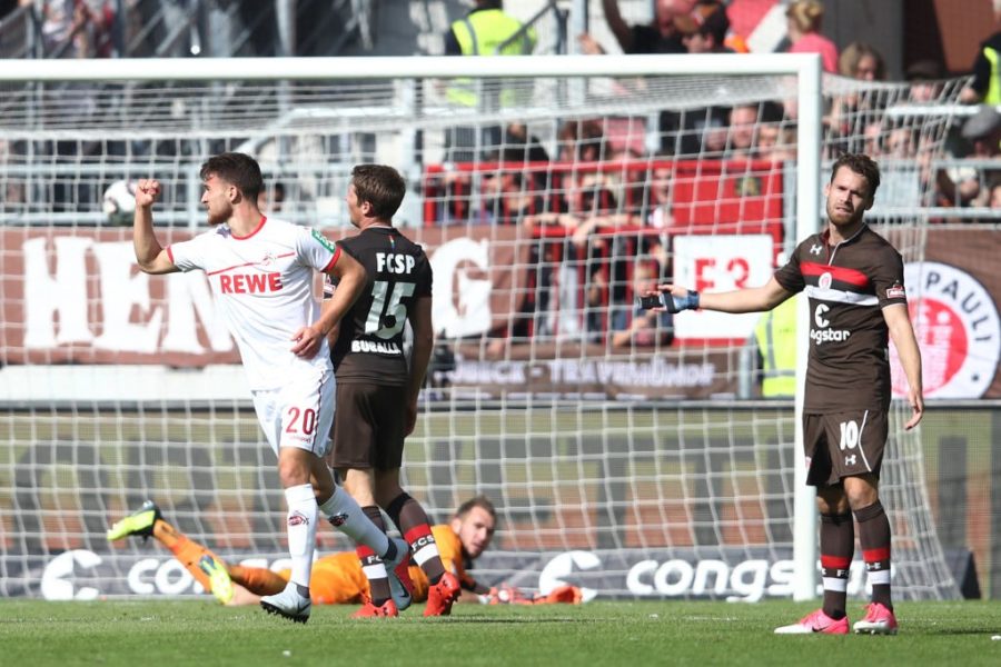 HAMBURG, GERMANY - SEPTEMBER 02: Salih Oezcan (L) of Koeln celebrates with after scoring their first goal during during the Second Bundesliga match between FC St. Pauli and 1. FC Koeln at Millerntor Stadium on September 2, 2018 in Hamburg, Germany. (Photo by Oliver Hardt/Bongarts/Getty Images