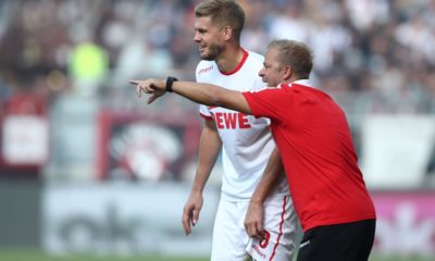 HAMBURG, GERMANY - SEPTEMBER 02: Simon Terodde and Head coach Markus Anfang (L-R) of Koeln talks during the Second Bundesliga match between FC St. Pauli and 1. FC Koeln at Millerntor Stadium on September 2, 2018 in Hamburg, Germany. (Photo by Oliver Hardt/Bongarts/Getty Images)