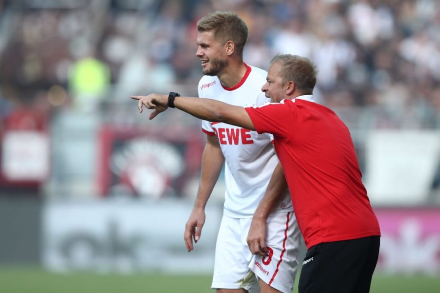 HAMBURG, GERMANY - SEPTEMBER 02: Simon Terodde and Head coach Markus Anfang (L-R) of Koeln talks during the Second Bundesliga match between FC St. Pauli and 1. FC Koeln at Millerntor Stadium on September 2, 2018 in Hamburg, Germany. (Photo by Oliver Hardt/Bongarts/Getty Images)