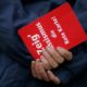 HANOVER, GERMANY - OCTOBER 21: Fans show a red card against racism during the Bundesliga match between Hanover 96 and VfL Wolfsburg at the AWD Arena on October 21, 2007 in Hanover, Germany. (Photo by Friedemann Vogel/Bongarts/Getty Images)