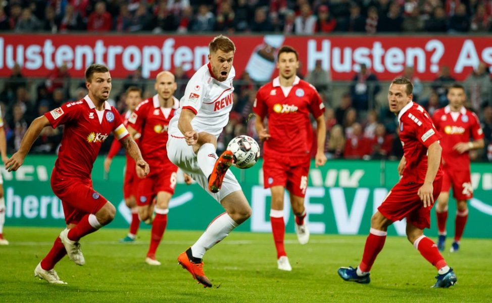 COLOGNE, GERMANY - OCTOBER 08: Simon Terodde of Koeln runs with the ball during the Second Bundesliga match between 1. FC Koeln and MSV Duisburg at RheinEnergieStadion on October 8, 2018 in Cologne, Germany. (Photo by Lars Baron/Bongarts/Getty Images)