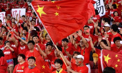 BRISBANE, AUSTRALIA - JANUARY 14: Chinese fans show their support during the 2015 Asian Cup match between China PR and Uzbekistan at Suncorp Stadium on January 14, 2015 in Brisbane, Australia. (Photo by Bradley Kanaris/Getty Images)