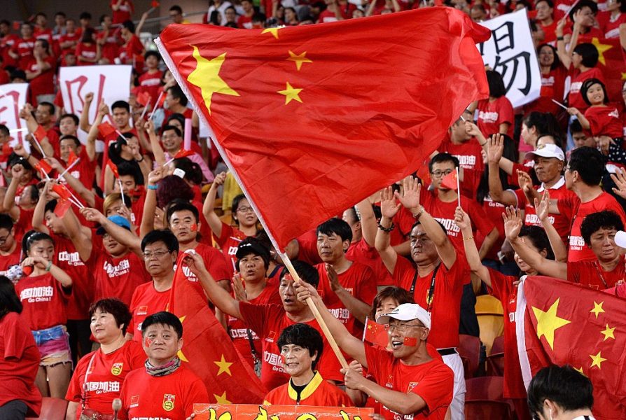 BRISBANE, AUSTRALIA - JANUARY 14: Chinese fans show their support during the 2015 Asian Cup match between China PR and Uzbekistan at Suncorp Stadium on January 14, 2015 in Brisbane, Australia. (Photo by Bradley Kanaris/Getty Images)