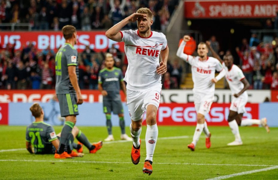 COLOGNE, GERMANY - SEPTEMBER 25: Simon Terodde of Koeln celebrates after scoring his teams second goal during the Second Bundesliga match between 1. FC Koeln and FC Ingolstadt 04 at RheinEnergieStadion on September 25, 2018 in Cologne, Germany. (Photo by Lars Baron/Bongarts/Getty Images