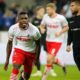 COLOGNE, GERMANY - DECEMBER 17: Jhon Cordoba of Cologne (L) celebrates scoring the 1:0 goal during the Second Bundesliga match between 1. FC Koeln and 1. FC Magdeburg at RheinEnergieStadion on December 17, 2018 in Cologne, Germany. (Photo by Mika Volkmann/Bongarts/Getty Images)