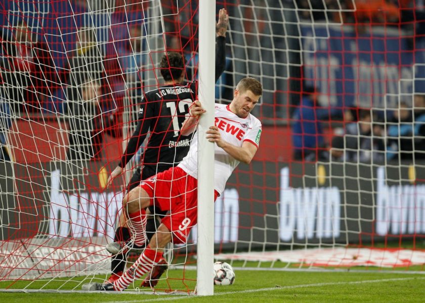 COLOGNE, GERMANY - DECEMBER 17: Simon Terodde of Cologne scores the 3:0 goal during the Second Bundesliga match between 1. FC Koeln and 1. FC Magdeburg at RheinEnergieStadion on December 17, 2018 in Cologne, Germany. (Photo by Mika Volkmann/Bongarts/Getty Images)