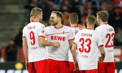 COLOGNE, GERMANY - DECEMBER 17: Simon Terodde of Cologne (L) celebrates scoring the 3:0 goal with Rafael Czichos of Cologne during the Second Bundesliga match between 1. FC Koeln and 1. FC Magdeburg at RheinEnergieStadion on December 17, 2018 in Cologne, Germany. (Photo by Mika Volkmann/Bongarts/Getty Images)