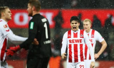 COLOGNE, GERMANY - DECEMBER 16: Jorge Mere, Timo Horn and Tim Handwerker of FC Koeln celebrate after victory in the Bundesliga match between 1. FC Koeln and VfL Wolfsburg at RheinEnergieStadion on December 16, 2017 in Cologne, Germany. (Photo by Dean Mouhtaropoulos/Bongarts/Getty Images)