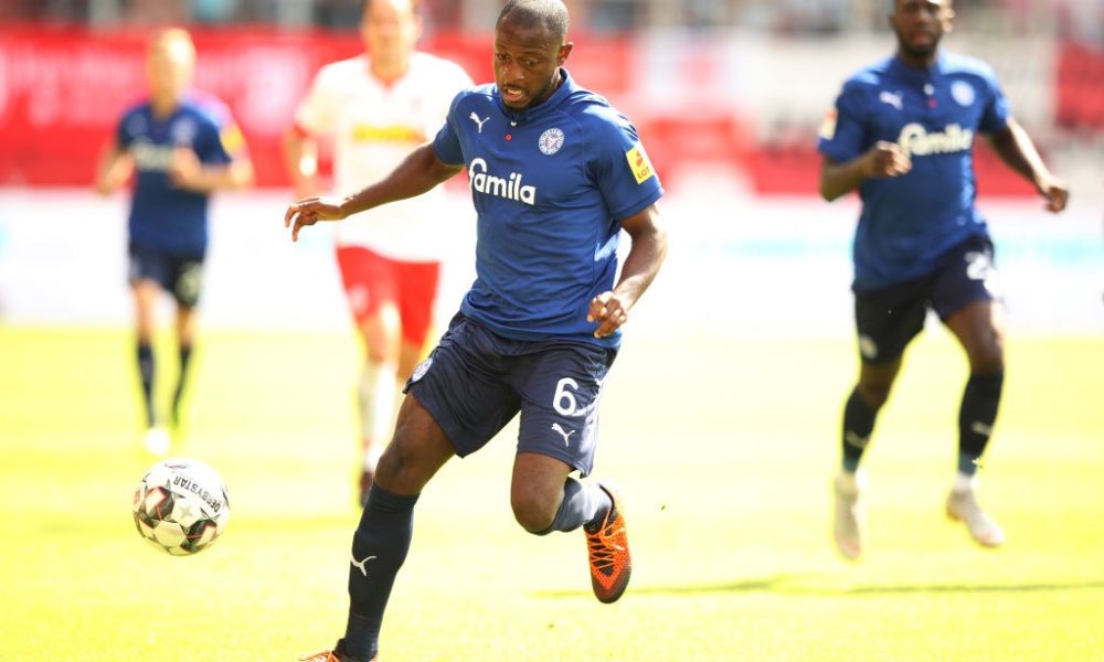 REGENSBURG, GERMANY - AUGUST 26: David Kinsombi of Holstein Kiel controls the ball during the Second Bundesliga match between SSV Jahn Regensburg and Holstein Kiel at Continental Arena on August 26, 2018 in Regensburg, Germany. (Photo by Adam Pretty/Bongarts/Getty Images)