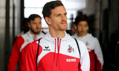 SINSHEIM, GERMANY - MARCH 31: Simon Zoller of Koeln walks out of the bus prior to the Bundesliga match between TSG 1899 Hoffenheim and 1. FC Koeln at Wirsol Rhein-Neckar-Arena on March 31, 2018 in Sinsheim, Germany.