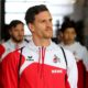 SINSHEIM, GERMANY - MARCH 31: Simon Zoller of Koeln walks out of the bus prior to the Bundesliga match between TSG 1899 Hoffenheim and 1. FC Koeln at Wirsol Rhein-Neckar-Arena on March 31, 2018 in Sinsheim, Germany.