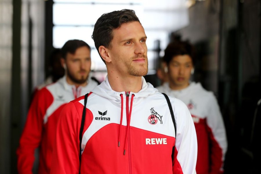 SINSHEIM, GERMANY - MARCH 31: Simon Zoller of Koeln walks out of the bus prior to the Bundesliga match between TSG 1899 Hoffenheim and 1. FC Koeln at Wirsol Rhein-Neckar-Arena on March 31, 2018 in Sinsheim, Germany.