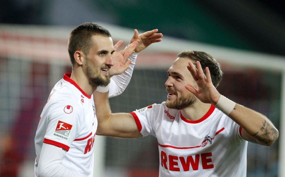 COLOGNE, GERMANY - DECEMBER 17: Dominick Drexler of Cologne (L) celebrates scoring the 2:0 goal with Rafael Czichos of Cologne during the Second Bundesliga match between 1. FC Koeln and 1. FC Magdeburg at RheinEnergieStadion on December 17, 2018 in Cologne, Germany. (Photo by Mika Volkmann/Bongarts/Getty Images)