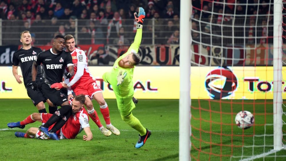 BERLIN, GERMANY - JANUARY 31: Florian Huebner #19 of Berlin scores his team's second goal past goalkeeper Timo Horn of Koeln during the Second Bundesliga match between 1. FC Union Berlin and 1. FC Koeln at Stadion An der Alten Foersterei on January 31, 2019 in Berlin, Germany. (Photo by Stuart Franklin/Bongarts/Getty Images)