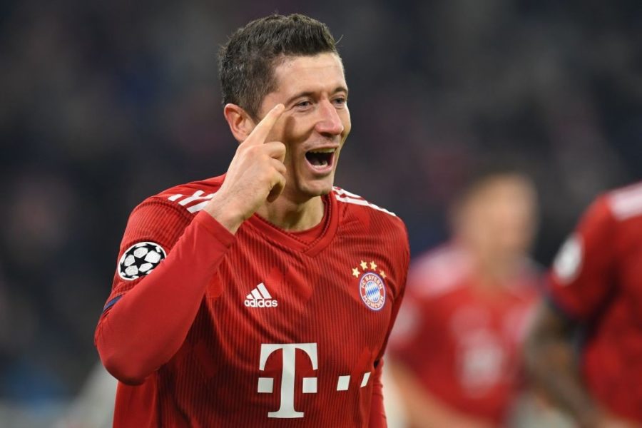 Bayern Munich's Polish forward Robert Lewandowski celebrates after scoring the 4-1 goal during the UEFA Champions League Group E football match between Bayern Munich and Benfica Lisbon in Munich, southern Germany, on November 27, 2018. (Photo by Christof STACHE / AFP) (Photo credit should read CHRISTOF STACHE/AFP/Getty Images)