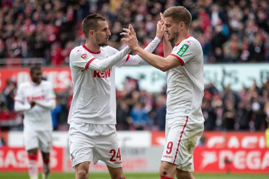 COLOGNE, GERMANY - MARCH 09: Simon Terodde #9 of 1. FC Koeln celebrates scoring her sides fourth goal during the Second Bundesliga match between 1. FC Koeln and DSC Arminia Bielefeld at RheinEnergieStadion on March 09, 2019 in Cologne, Germany. (Photo by Maja Hitij/Bongarts/Getty Images)