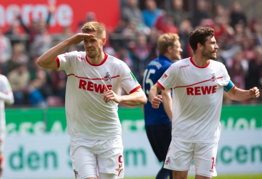 COLOGNE, GERMANY - MARCH 31: Simon Terodde of Cologne (L) and Jonas Hector celebrate during the Second Bundesliga match between 1. FC Koeln and Holstein Kiel at RheinEnergieStadion on March 31, 2019 in Cologne, Germany. (Photo by Juergen Schwarz/Bongarts/Getty Images)