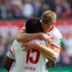 COLOGNE, GERMANY - MARCH 31: Jhon Cordoba of Cologne (L) and Simon Terodde celebrate during the Second Bundesliga match between 1. FC Koeln and Holstein Kiel at RheinEnergieStadion on March 31, 2019 in Cologne, Germany. (Photo by Juergen Schwarz/Bongarts/Getty Images)