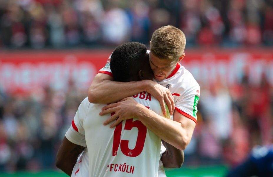 COLOGNE, GERMANY - MARCH 31: Jhon Cordoba of Cologne (L) and Simon Terodde celebrate during the Second Bundesliga match between 1. FC Koeln and Holstein Kiel at RheinEnergieStadion on March 31, 2019 in Cologne, Germany. (Photo by Juergen Schwarz/Bongarts/Getty Images)