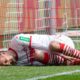 COLOGNE, GERMANY - MARCH 31: Dominick Drexler of Cologne lies on the pitch during the Second Bundesliga match between 1. FC Koeln and Holstein Kiel at RheinEnergieStadion on March 31, 2019 in Cologne, Germany. (Photo by Juergen Schwarz/Bongarts/Getty Images)