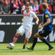 COLOGNE, GERMANY - MARCH 31: Christian Clemens of Cologne (L) and Hauke Wahl of Kiel battle for the ball during the Second Bundesliga match between 1. FC Koeln and Holstein Kiel at RheinEnergieStadion on March 31, 2019 in Cologne, Germany. (Photo by Juergen Schwarz/Bongarts/Getty Images)
