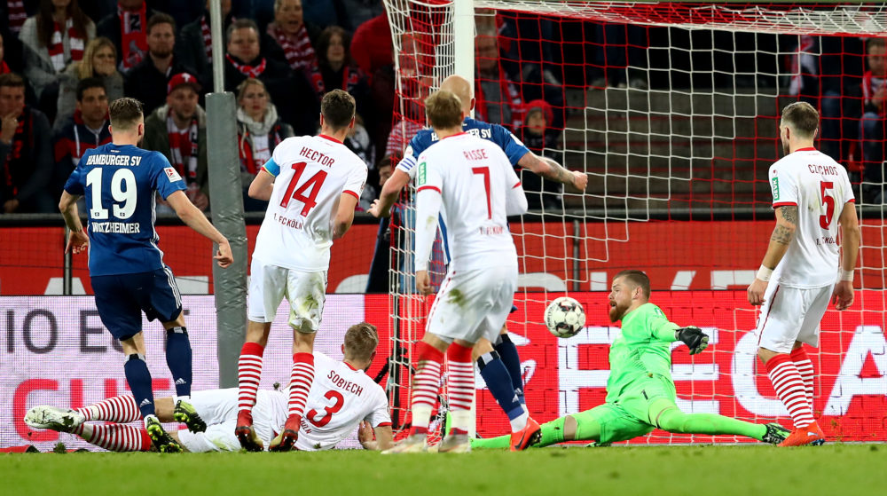 COLOGNE, GERMANY - APRIL 15: Manuel Wintzheimer #19 of Hamburg scores the equalizing goal during the Second Bundesliga match between 1. FC Koeln and Hamburger SV at RheinEnergieStadion on April 15, 2019 in Cologne, Germany. (Photo by Lars Baron/Bongarts/Getty Images)