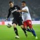 HAMBURG, GERMANY - NOVEMBER 05: Douglas Santos (R) of Hamburg is challenged for the ball by Louis Schaub (L) of Koeln during the Second Bundesliga match between Hamburger SV and 1. FC Koeln at Volksparkstadion on November 5, 2018 in Hamburg, Germany. (Photo by Oliver Hardt/Bongarts/Getty Images)