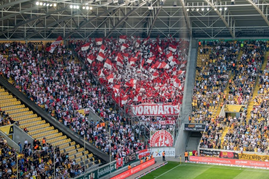 DRESDEN, GERMANY - APRIL 21: Fans of Koeln support their team during the Second Bundesliga match between SG Dynamo Dresden and 1. FC Koeln at Rudolf-Harbig-Stadion on April 21, 2019 in Dresden, Germany. (Photo by Thomas Eisenhuth/Bongarts/Getty Images)