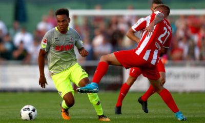 HAIGER, GERMANY - AUGUST 07: Dennis Wegner of Steinbach (R) challenges Nikolas Nartey of Kln (L) during the preseason friendly match between TSV Steinbach and 1. FC Koeln at Sibre-Sportzentrum Haarwasen on August 7, 2017 in Haiger, Germany. The match between Steinbach and Koeln ended 1-1. (Photo by Christof Koepsel/Bongarts/Getty Images)