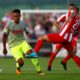 HAIGER, GERMANY - AUGUST 07: Dennis Wegner of Steinbach (R) challenges Nikolas Nartey of Kln (L) during the preseason friendly match between TSV Steinbach and 1. FC Koeln at Sibre-Sportzentrum Haarwasen on August 7, 2017 in Haiger, Germany. The match between Steinbach and Koeln ended 1-1. (Photo by Christof Koepsel/Bongarts/Getty Images)