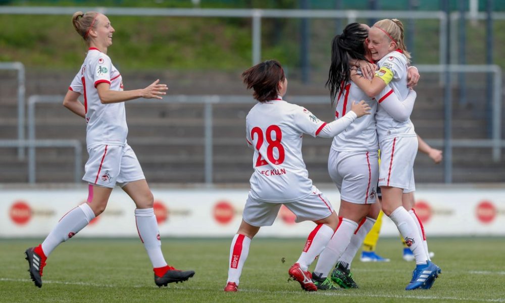 COLOGNE, GERMANY - MAY 12: Anna Isabelle Linden, Yuka Hirano, and Peggy Nietgen and Anna Kirschbaum of Koeln celebrate their goal during the women's second Bundesliga match between 1.FC Koeln and 1.FC Saarbruecken at Franz-Kremer Stadion on May 12, 2019 in Cologne, Germany. (Photo by Jörg Halisch/Bongarts/Getty Images)