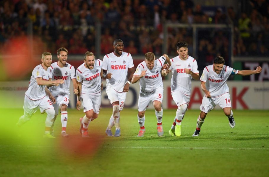 WIESBADEN, GERMANY - AUGUST 11: The players of Koeln celebrate after winning the penalty shoot-out during the DFB Cup first round match between SV Wehen Wiesbaden and 1. FC Koeln at BRITA-Arena on August 11, 2019 in Wiesbaden, Germany. (Photo by Matthias Hangst/Bongarts/Getty Images)