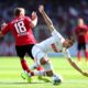 FREIBURG IM BREISGAU, GERMANY - AUGUST 31: Ellyes Skhiri of 1. FC Koln battles for possession with Nils Petersen of Sport-Club Freiburg during the Bundesliga match between Sport-Club Freiburg and 1. FC Koeln at Schwarzwald-Stadion on August 31, 2019 in Freiburg im Breisgau, Germany. (Photo by Simon Hofmann/Bongarts/Getty Images)