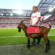 COLOGNE, GERMANY - AUGUST 23: Hennes the 1. FC Koeln mascot is seen prior to the Bundesliga match between 1. FC Koeln and Borussia Dortmund at RheinEnergieStadion on August 23, 2019 in Cologne, Germany. (Photo by Lars Baron/Bongarts/Getty Images)