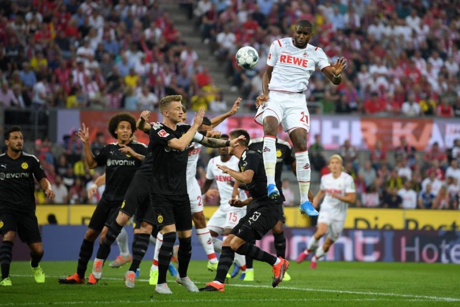 COLOGNE, GERMANY - AUGUST 23: Anthony Modeste of 1. FC Koeln rises to head the ball during the Bundesliga match between 1. FC Koeln and Borussia Dortmund at RheinEnergieStadion on August 23, 2019 in Cologne, Germany. (Photo by Matthias Hangst/Bongarts/Getty Images)