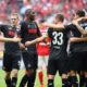 MUNICH, GERMANY - OCTOBER 01: Anthony Modeste (3L) of Koeln and team mates celebrate after the Bundesliga match between Bayern Muenchen and 1. FC Koeln at Allianz Arena on October 1, 2016 in Munich, Germany. (Photo by Alex Grimm/Bongarts/Getty Images)