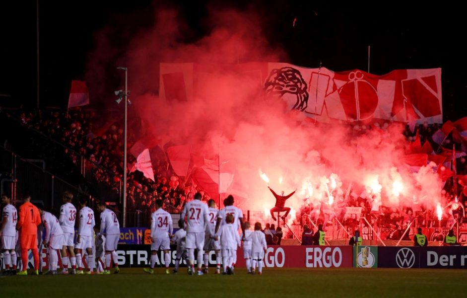 SAARBRUECKEN, GERMANY - OCTOBER 29: Fans let off flares as the FC Koeln team walk out prior to the DFB Cup second round match between 1. FC Saarbruecken and 1. FC Koeln at Ludwigspark Stadion on October 29, 2019 in Saarbruecken, Germany. (Photo by Alex Grimm/Bongarts/Getty Images)