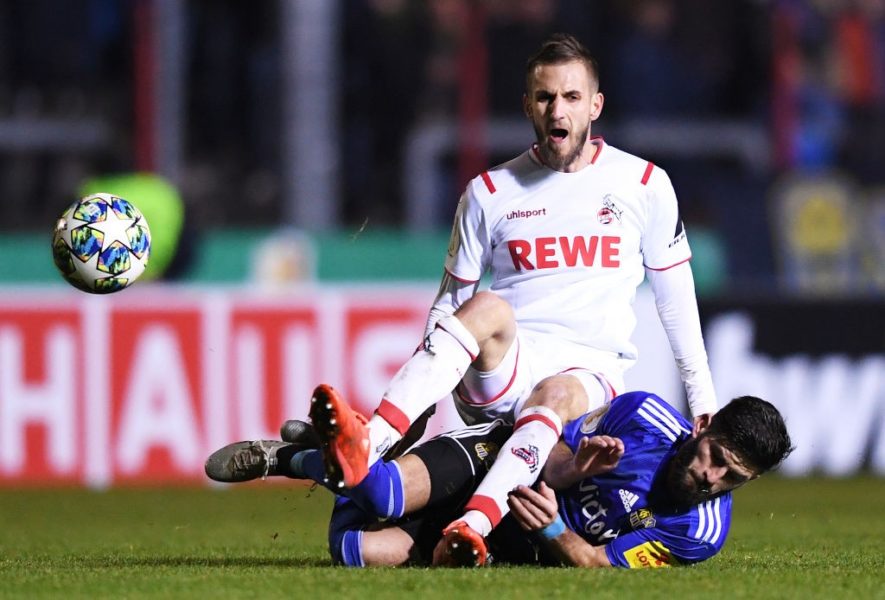 SAARBRUECKEN, GERMANY - OCTOBER 29: Dominick Drexler of 1. FC Koeln is challenged by Fanol Perdedaj of 1 FC. Saarbruecken during the DFB Cup second round match between 1. FC Saarbruecken and 1. FC Koeln at Ludwigspark Stadion on October 29, 2019 in Saarbruecken, Germany. (Photo by Alex Grimm/Bongarts/Getty Images)