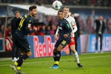 Cologne's defender Ismail Jakobs (C) and Leipzig's German defender Lukas Klostermann (R) vie for the ball during the German first division Bundesliga football match RB Leipzig v FC Cologne in Leipzig, eastern Germany, on November 23, 2019. (Photo by Odd Andersen / AFP) / RESTRICTIONS: DFL REGULATIONS PROHIBIT ANY USE OF PHOTOGRAPHS AS IMAGE SEQUENCES AND/OR QUASI-VIDEO (Photo by ODD ANDERSEN/AFP via Getty Images)