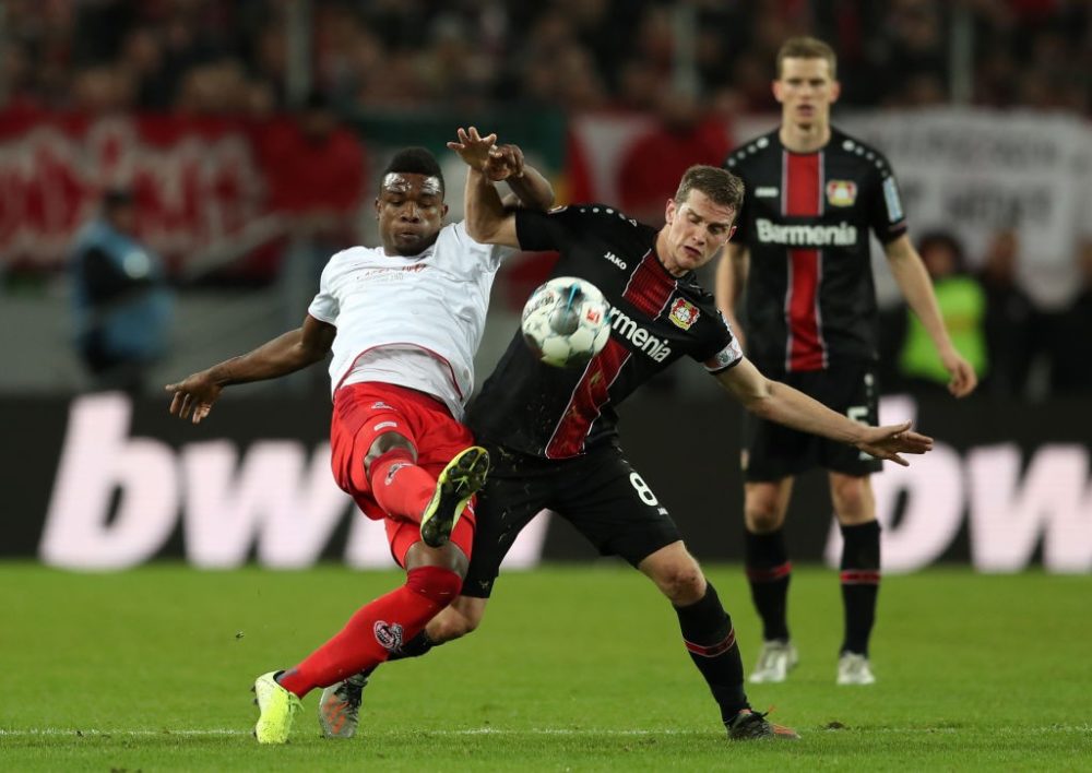 COLOGNE, GERMANY - DECEMBER 14: Jhon Cordoba of 1. FC Koeln battles for possession with Lars Bender of Bayer 04 Leverkusen during the Bundesliga match between 1. FC Koeln and Bayer 04 Leverkusen at RheinEnergieStadion on December 14, 2019 in Cologne, Germany. (Photo by Lars Baron/Bongarts/Getty Images)