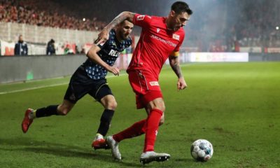 BERLIN, GERMANY - DECEMBER 08: Dominick Drexler of 1. FC Koeln battles for possession with Christopher Trimmel of 1. FC Union Berlin during the Bundesliga match between 1. FC Union Berlin and 1. FC Koeln at Stadion An der Alten Foersterei on December 08, 2019 in Berlin, Germany. (Photo by Maja Hitij/Bongarts/Getty Images)