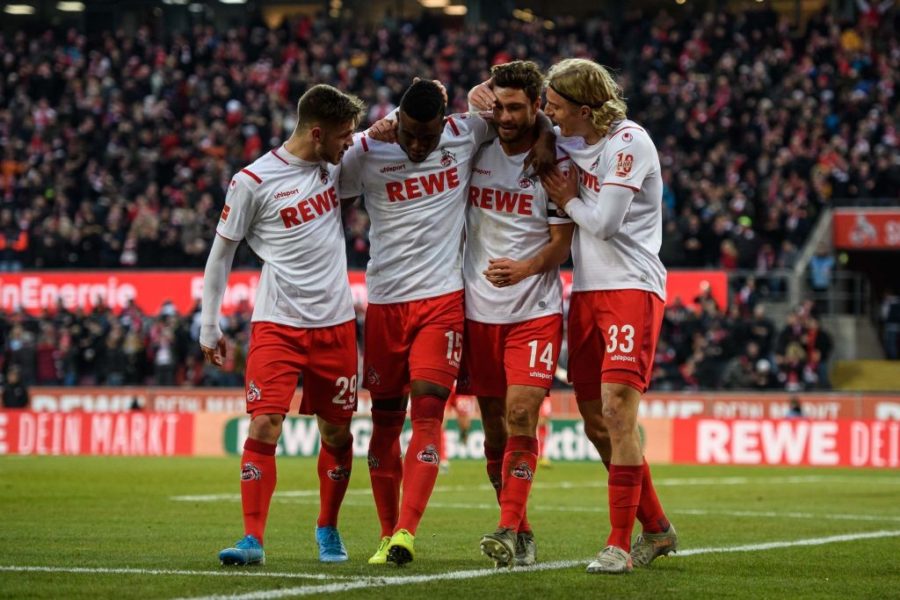 COLOGNE, GERMANY - JANUARY 18: L-R Jan Thielmann, Jhon Cordoba, Jonas Hector and Sebastian Bornauw of Cologne celebrate after their teams third goal during the Bundesliga match between 1. FC Koeln and VfL Wolfsburg at RheinEnergieStadion on January 18, 2020 in Cologne, Germany. (Photo by Jörg Schüler/Bongarts/Getty Images)