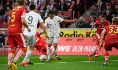 Bayern Munich's German midfielder Serge Gnabry (C) scores th 0-4 goal during the German first division Bundesliga football match 1 FC Cologne v FC Bayern Munich in Cologne, western Germany on February 16, 2020. (Photo by INA FASSBENDER / AFP) / RESTRICTIONS: DFL REGULATIONS PROHIBIT ANY USE OF PHOTOGRAPHS AS IMAGE SEQUENCES AND/OR QUASI-VIDEO (Photo by INA