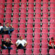 COLOGNE, GERMANY - AUGUST 10: Spectators watch the Second Bundesliga match between 1. FC Koeln and SV Sandhausen at RheinEnergieStadion on August 10, 2012 in Cologne, Germany. (Photo by Dennis Grombkowski/Bongarts/Getty Images)